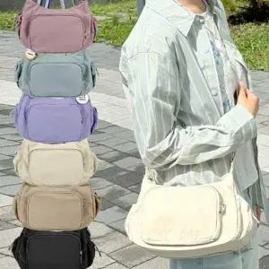 [에이치플러스몰]WL 사이드포켓 앞지퍼 포인트 나일론 크로스백 패션 어깨끈 조절