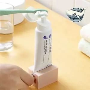 편리한 핑크 치약 클립 디스펜서 욕실 용품