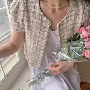 트위드 자켓 여자 린넨 크롭 코트 여성 가죽 청 재킷 여성용 짧은 격자 무늬 퍼프 반팔 O-넥 싱글 브레스트