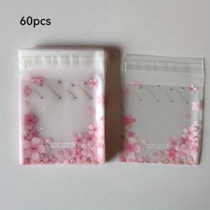 TEMU 체리 blossom 디자인의 투명한 프로스트 선물 가방 60개 세트. 핑크색 자체 밀봉 가방에 정리되어 있습니다. 정교한 선물, 소형 제품, 결혼식, 축하 행사, 생일 티 파티용 파티 답례품 포장에 이상적입니다.