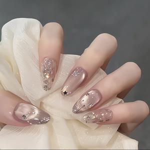 TEMU 나이트 핑크 고양이 눈 디자인의 보라색 타로 머드 아이스 네일, 섬세한 글리터 별이 부드러운 매력을 풍기며, 밝은 피부톤을 강화하는 데 적합합니다. 탈부착 가능한 이 네일 아트는 일상복 및 특별한 파티에 이상적입니다.