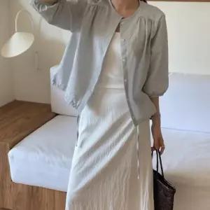 [옷자락] 여자 모던한 분위기 셔링 디테일 칠부 소매 가디건