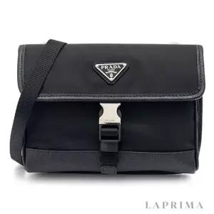 프라다 MUST IT_[PRADA 리나일론 사피아노 가죽 휴대폰 케이스 2ZH108-2DMH-F0002