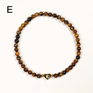 TEMU 유니크한 천연 타이거 아이 스톤 하트 팔찌. 14K 금도금 A-Z 레터 하트가 있는 탄성 디자인으로 캐주얼한 착용 또는 특별한 날에 완벽합니다. 친구, 연인 또는 가족을 위한 모든 계절에 이상적인 선물입니다.