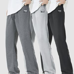 TEMU 3피스 남성 캐주얼 단색 런닝 팬츠, 라벨 디자인, 탄성 허리 밴드 및 포켓 디테일, 드로스트링 허리 밴드 운동복 트라우저, 니트 원단, 부드럽고 편안한 피트니스 운동복 바지, 흡습성 아웃도어 캐주얼 긴 바지