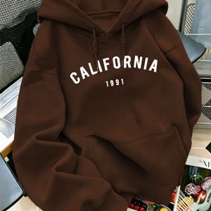 가을/겨울 트렌디 패션 CALIFORNIA 1991 프린트 美国 빈티지 스타일 드로스트링 후드 스웨트셔츠. 드로스트링이 달린 후드와 앞면 캥거루 포켓이 있어 추운 날씨에도 편안하게 착용 가능